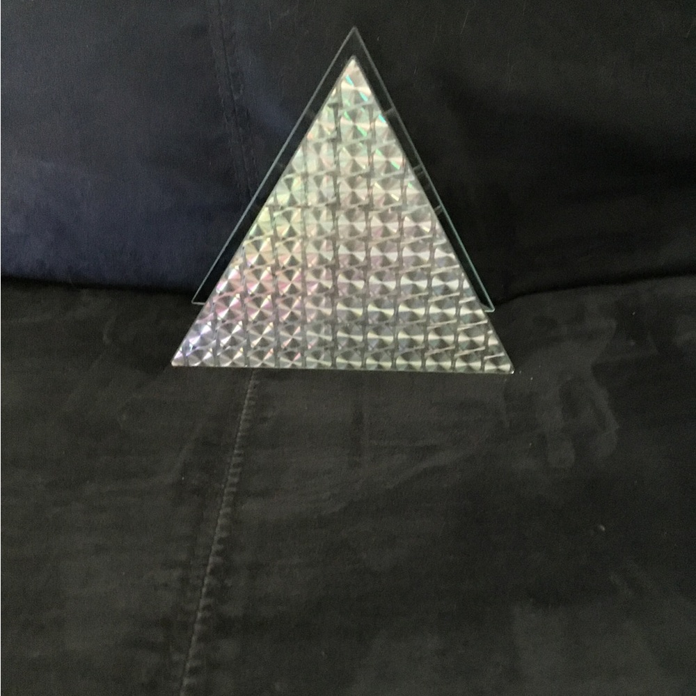 Candle holder. Triangular shape. Iridescent glass in front